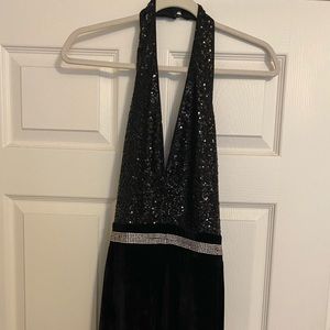 Black Venus velvet jumpsuit with added rhinestone belt